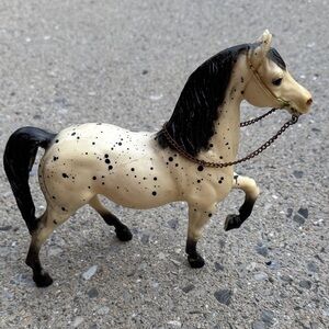 Spotted Black and Cream Horse Figurine
